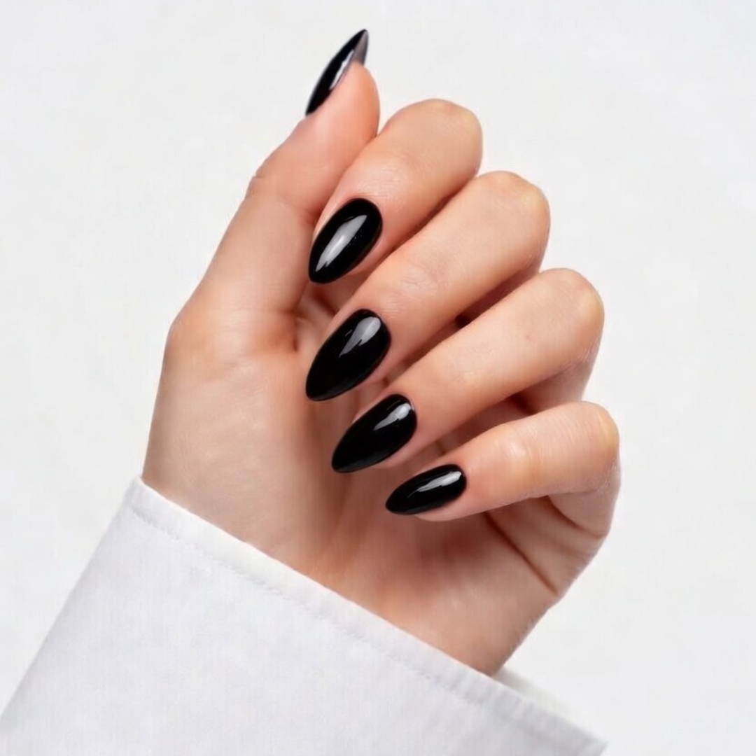 Hand with black nails on a white background